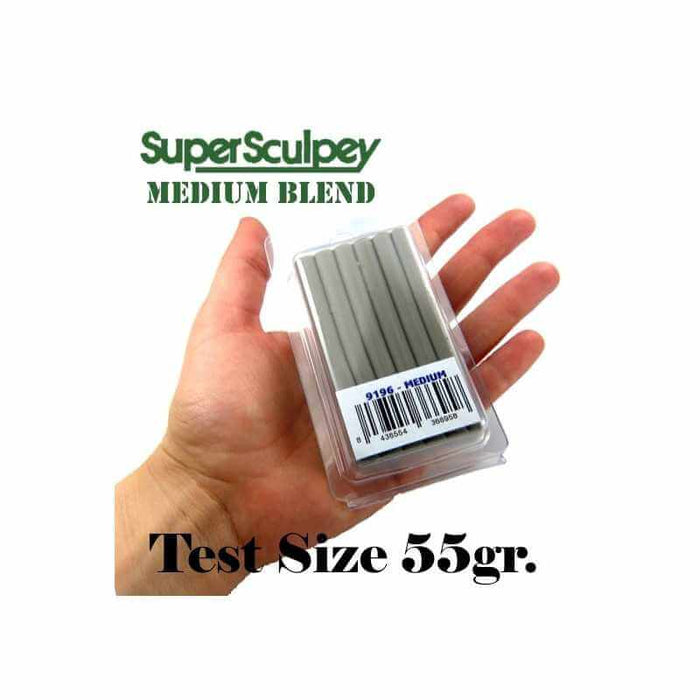Hand holding package of super sculpey medium gray blend 55 grams